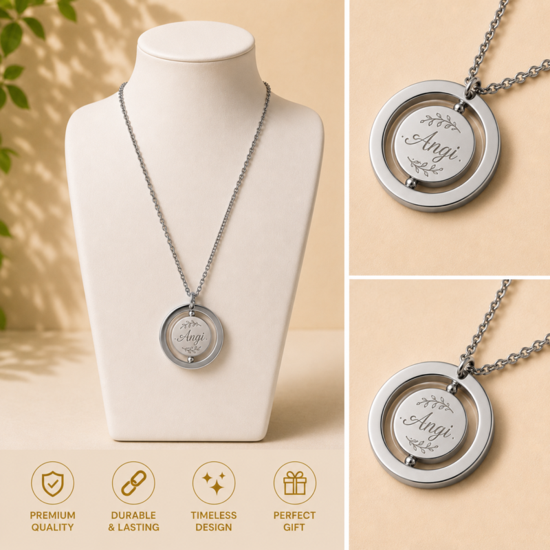 Custom engraved stainless steel spinner necklace with personalized name pendant in silver. Rotating circle pendant necklace featuring custom name engraving, durable stainless steel construction, timeless minimalist jewelry design, and meaningful personalized gift for birthdays, anniversaries, Mother's Day, Valentine's Day, weddings, and everyday wear.