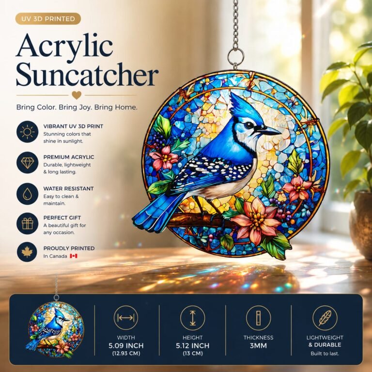 Blue Jay stained glass acrylic suncatcher with vibrant UV printed floral design hanging in a sunlit window.